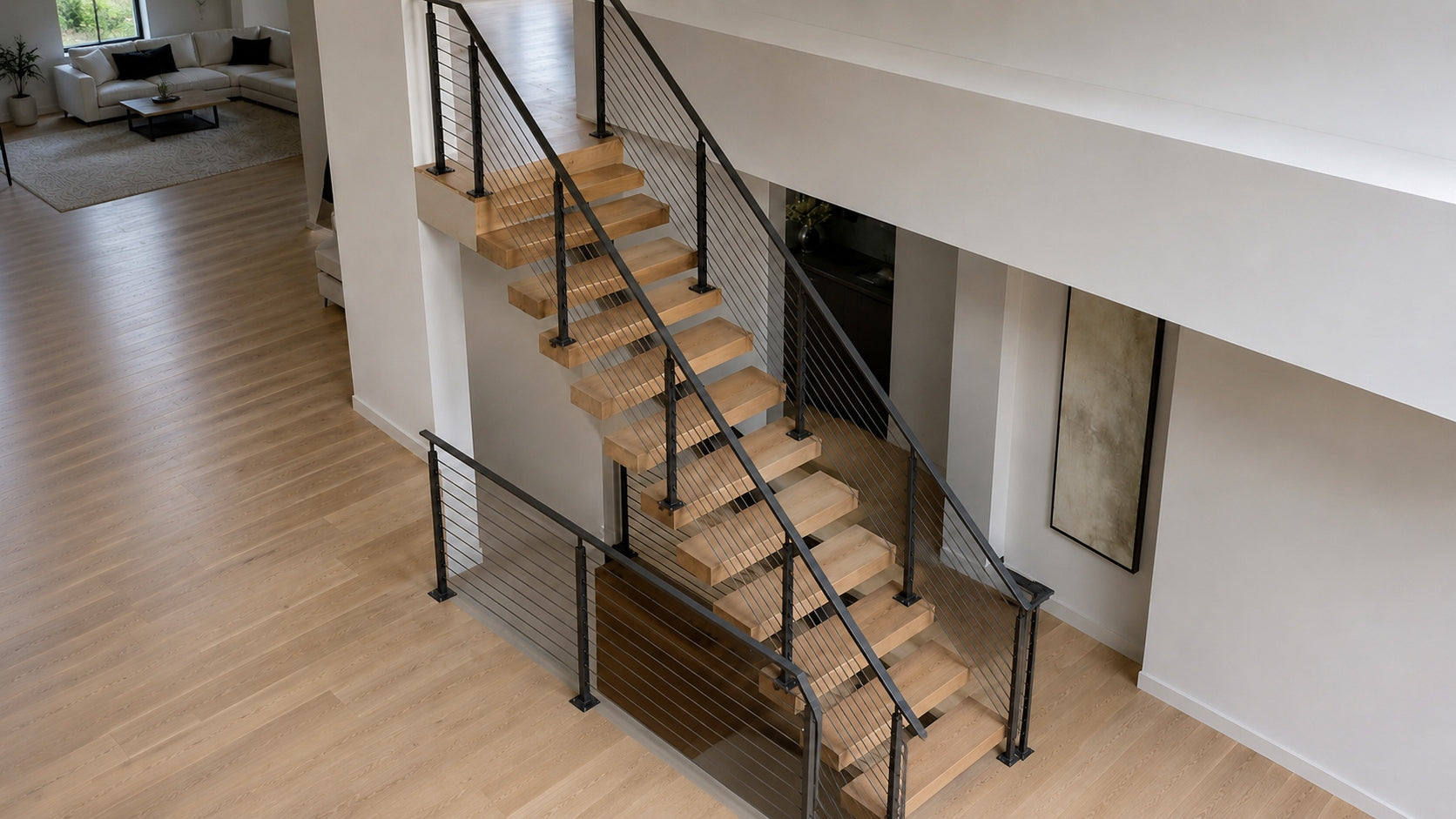 Floating stairs kit components with steel mono stringer, wood treads, mounting plates, hardware, glass railing, and cable railing samples.